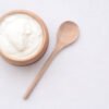 Aloe Butter in wooden bowl with woodn spoon